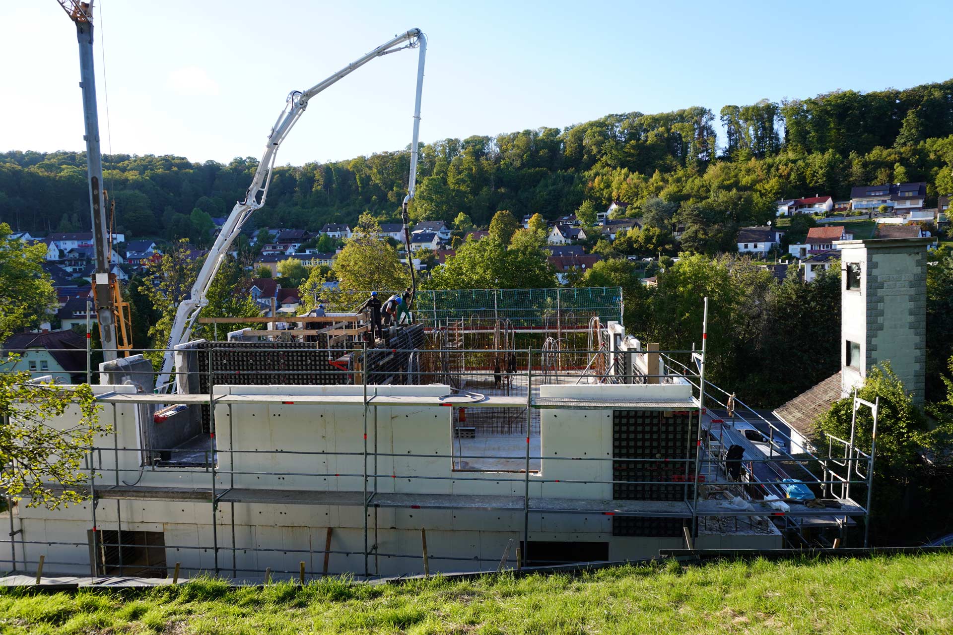 Several construction workers are working on a construction site